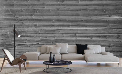Black and white wallpaper mural of an old barn wood wall. This wallpaper mural brings in depth and texture. These wood barn boards are a perfect accent to create that rustic feel in your space.