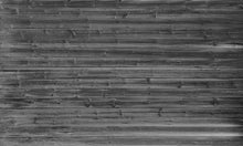 Load image into Gallery viewer, Black and white wallpaper mural of an old barn wood wall. This wallpaper mural brings in depth and texture. These wood barn boards are a perfect accent to create that rustic feel in your space.